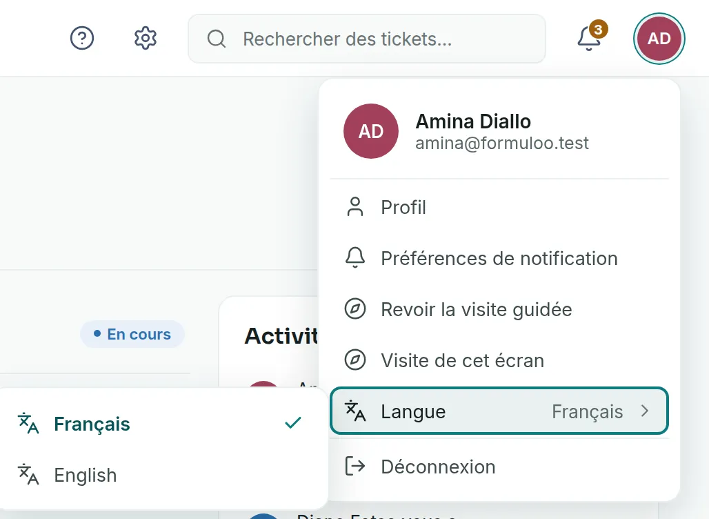 Le menu du compte ouvert, avec l’entrée Langue et son sous-menu, où Français est coché au-dessus d’English.